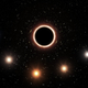 Artist’s impression of starlight’s wavelength stretched by a black hole